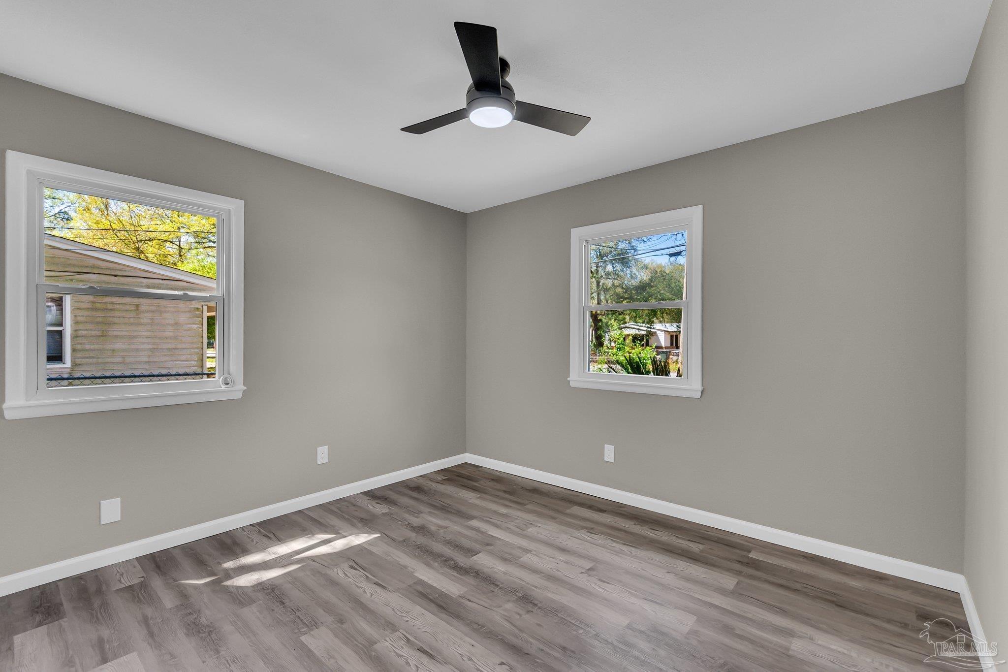 5636 Avondale Road Pensacola, FL 32526 - Photo 14 of 22 a view of empty room with window and ceiling fan