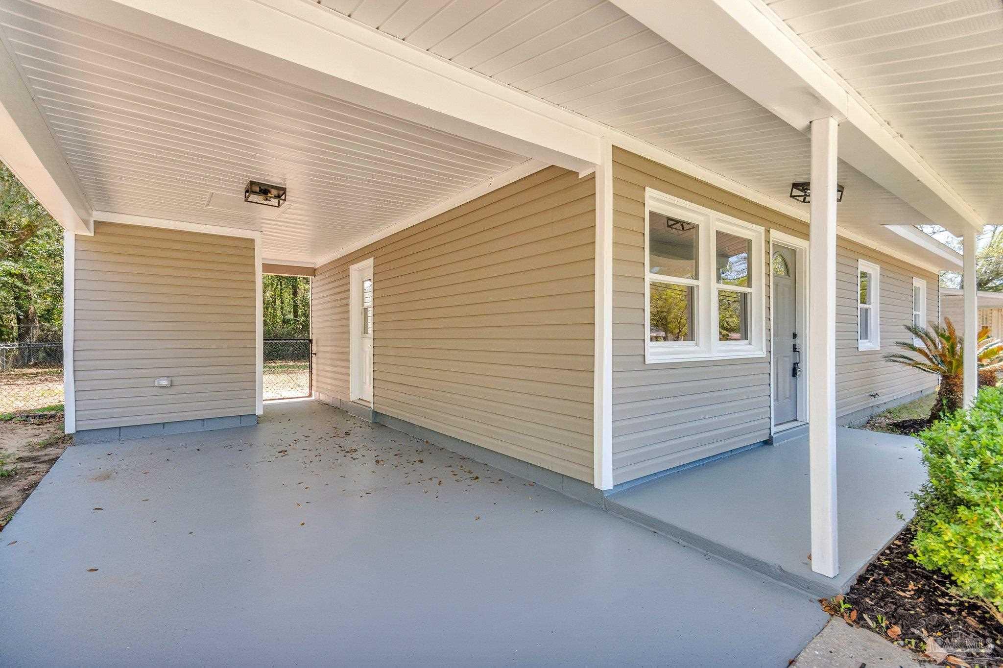 5636 Avondale Road Pensacola, FL 32526 - Photo 19 of 22 a view of a house with an empty space