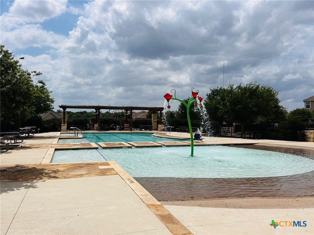 1949 Redstart New Braunfels, TX 78130 - Photo 30 of 32 a swimming pool with outdoor seating yard and barbeque oven