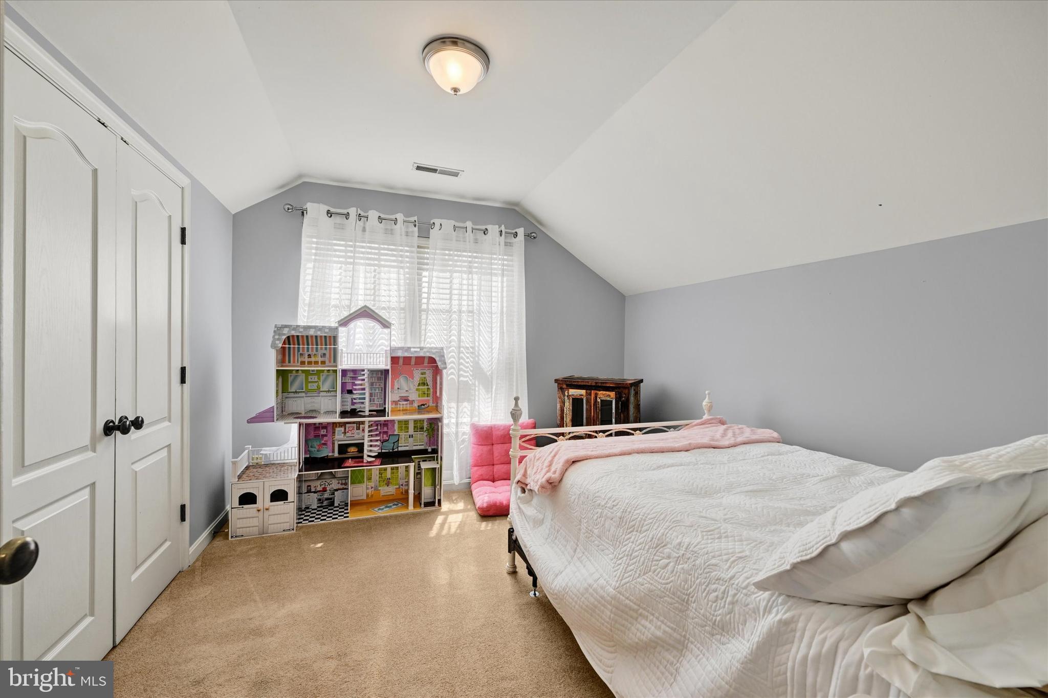 4642 Bucks School House Road Rosedale, MD 21237 - Photo 18 of 33 a bedroom with a bed and a large window