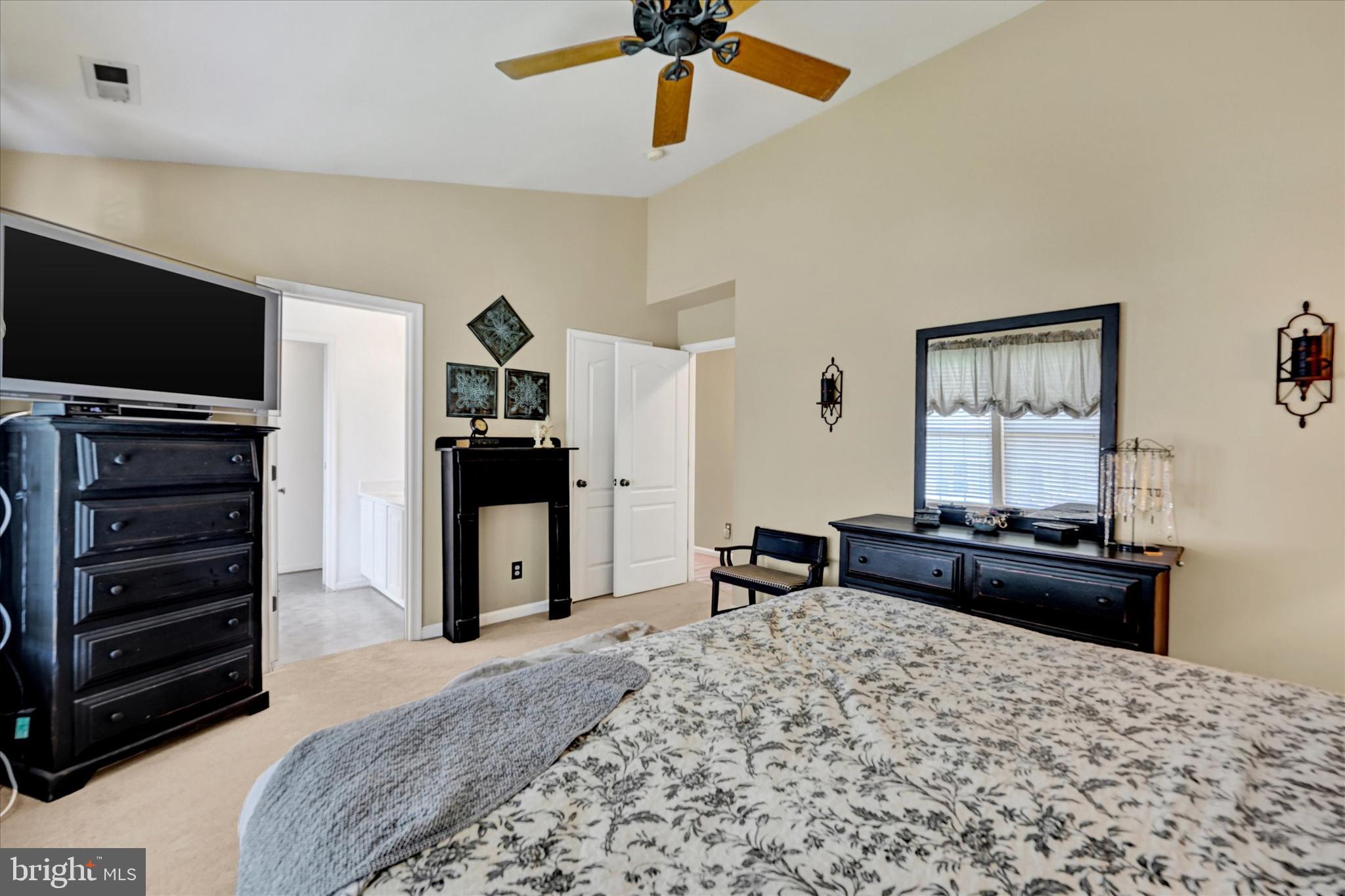 4642 Bucks School House Road Rosedale, MD 21237 - Photo 20 of 33 a bedroom with a bed and wooden floor
