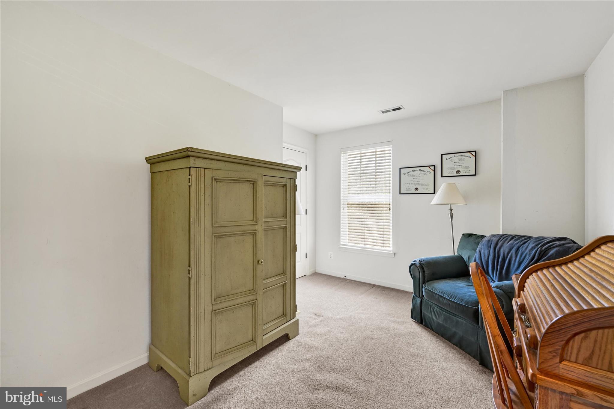 4642 Bucks School House Road Rosedale, MD 21237 - Photo 24 of 33 a bedroom with furniture and a closet