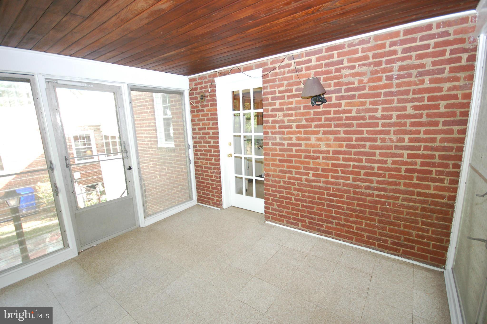 9209 Glenville Road Silver Spring, MD 20901 - Photo 11 of 30 Enclosed Rear Porch