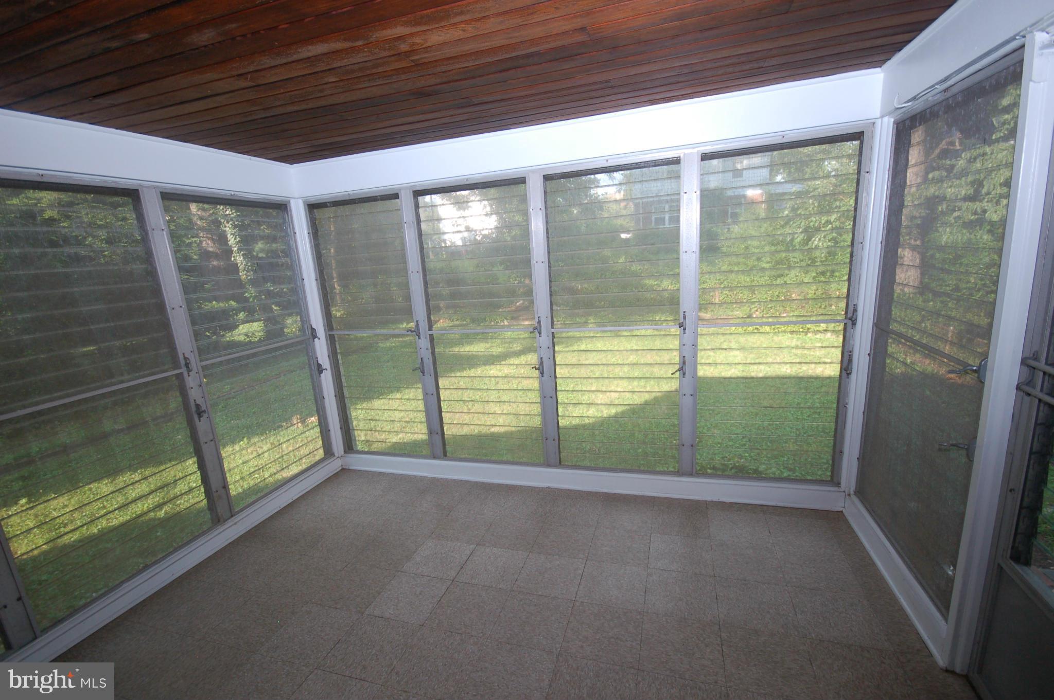 9209 Glenville Road Silver Spring, MD 20901 - Photo 12 of 30 Enclosed Rear Porch facing yard