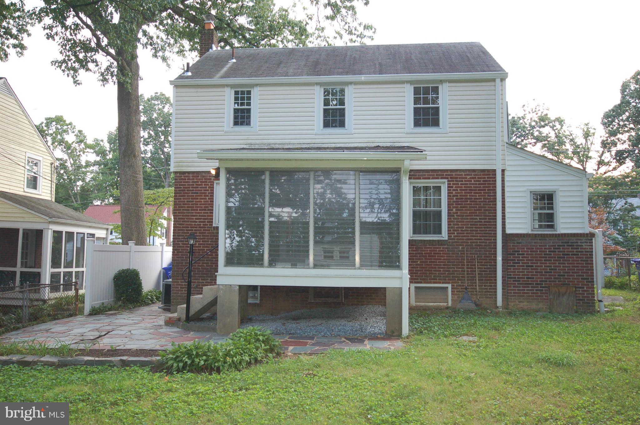 9209 Glenville Road Silver Spring, MD 20901 - Photo 20 of 30 Enclosed rear porch and patio