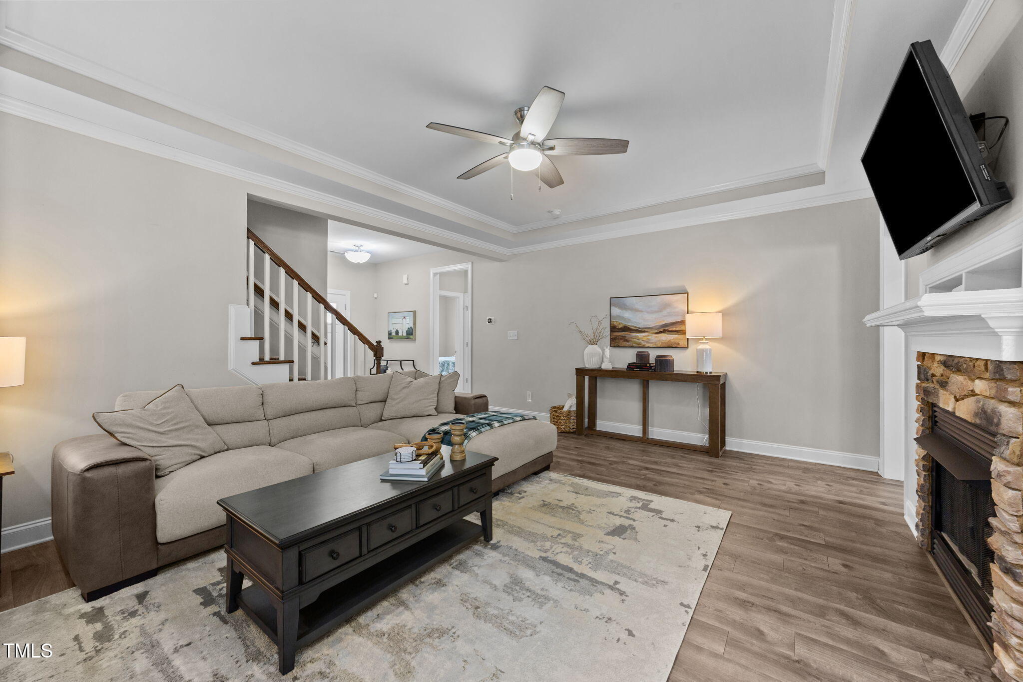 42 Torchie Drive Selma, NC 27576 - Photo 8 of 29 a living room with furniture and a flat screen tv