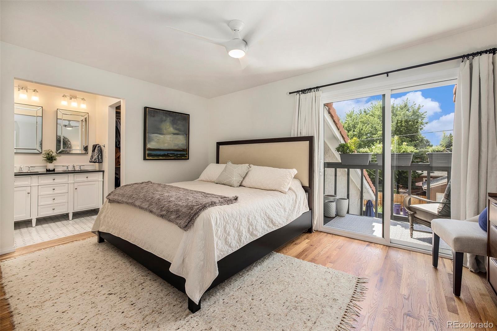 2365 Perry Street Denver, CO 80212 - Photo 16 of 24 a bedroom with a large bed and a view of bedroom