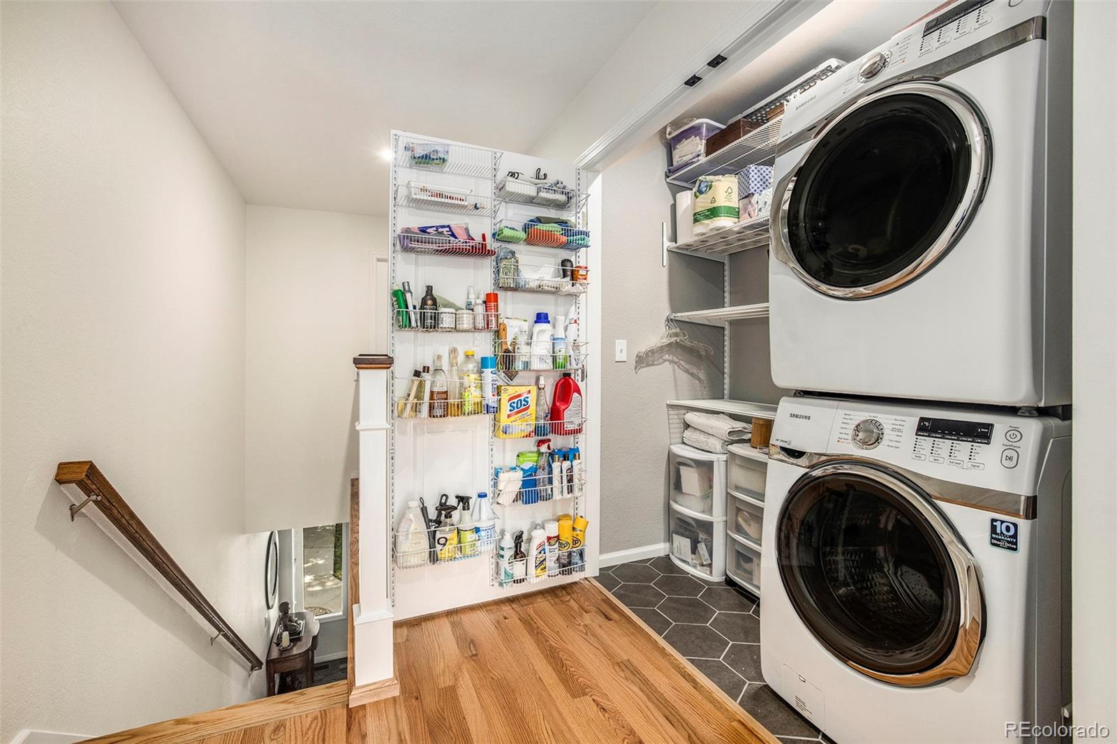 2365 Perry Street Denver, CO 80212 - Photo 22 of 24 a view of a storage and utility room with washer and dryer
