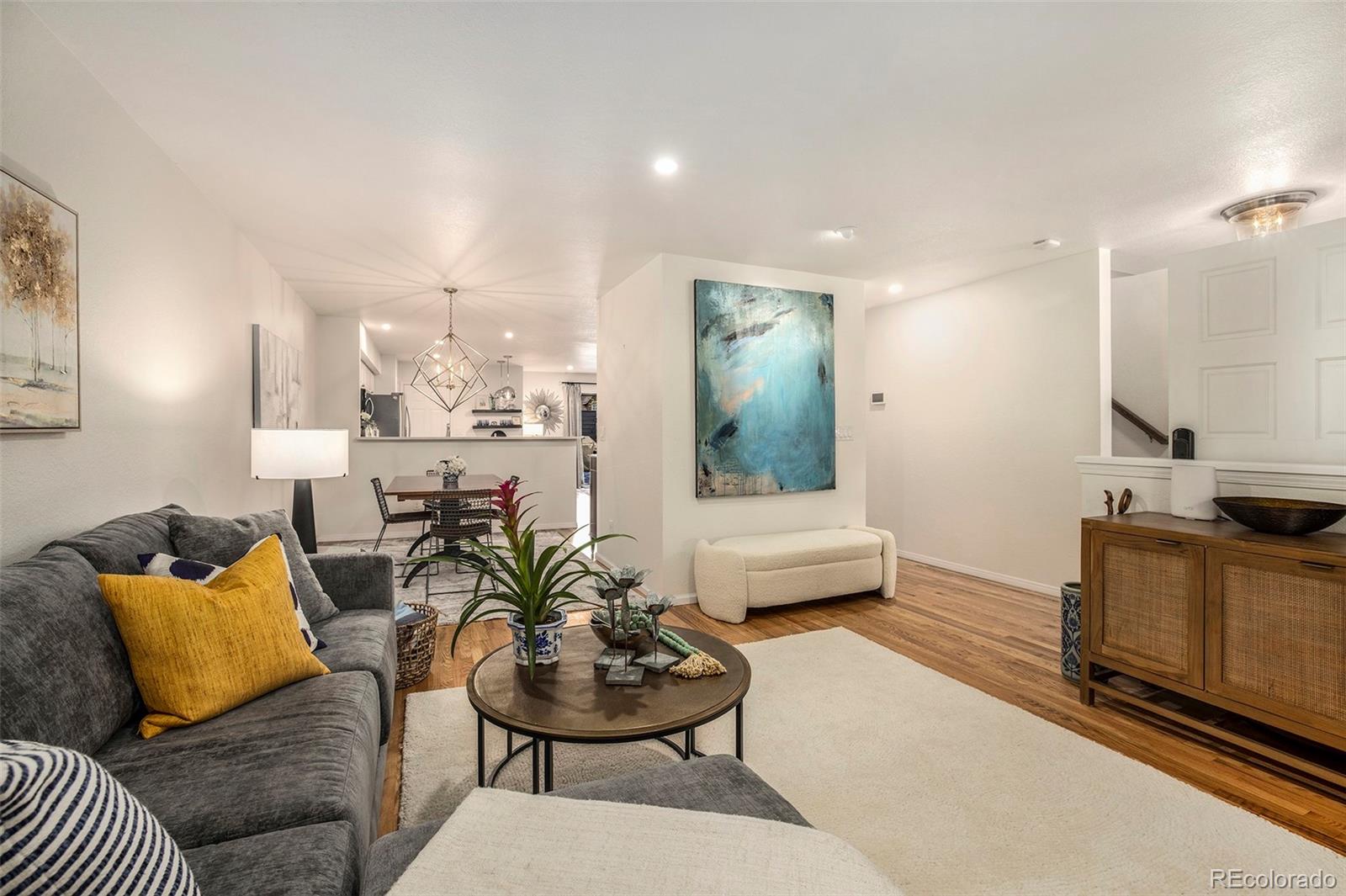2365 Perry Street Denver, CO 80212 - Photo 3 of 24 a living room with furniture and a couch
