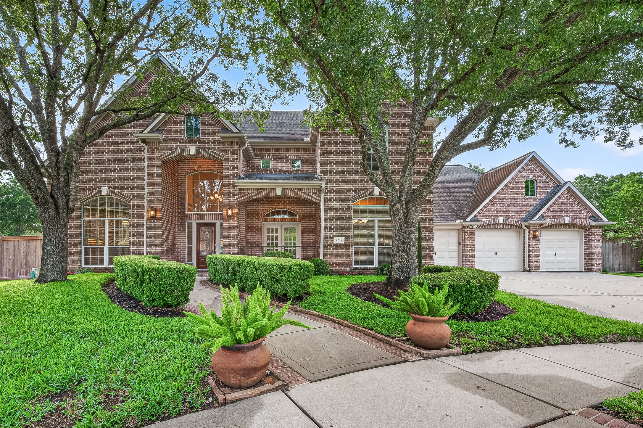 4203 Deforest Ridge Circle Katy, TX 77494 - Photo 1 of 50 Welcome to 4203 Deforest Ridge Circle in the exclusive, gated section of Cinco Ranch Bayou Oaks
