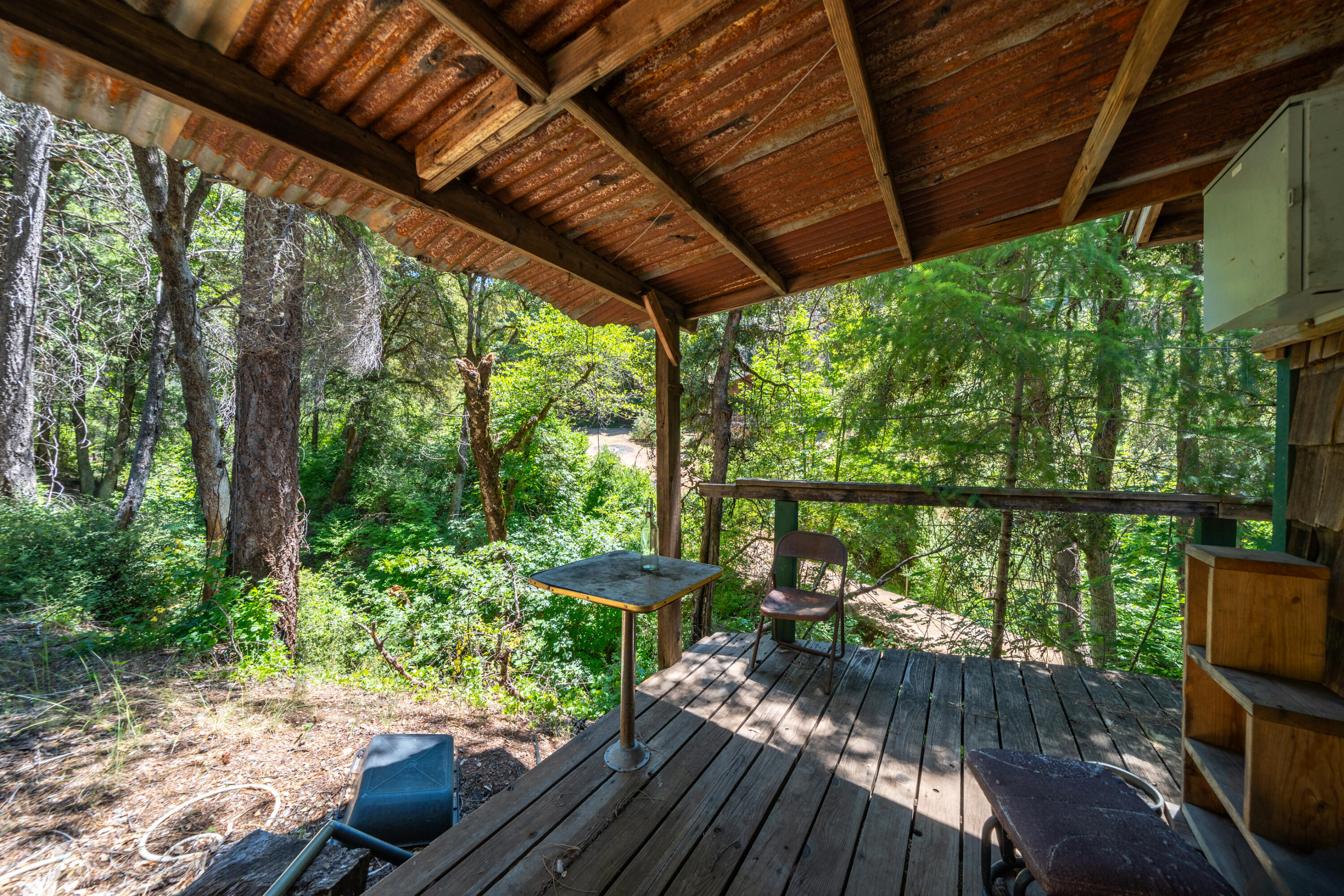 0 East Fork Road French Gulch, CA 96033 - Photo 13 of 78 a view of a chairs and table in patio with wooden fence