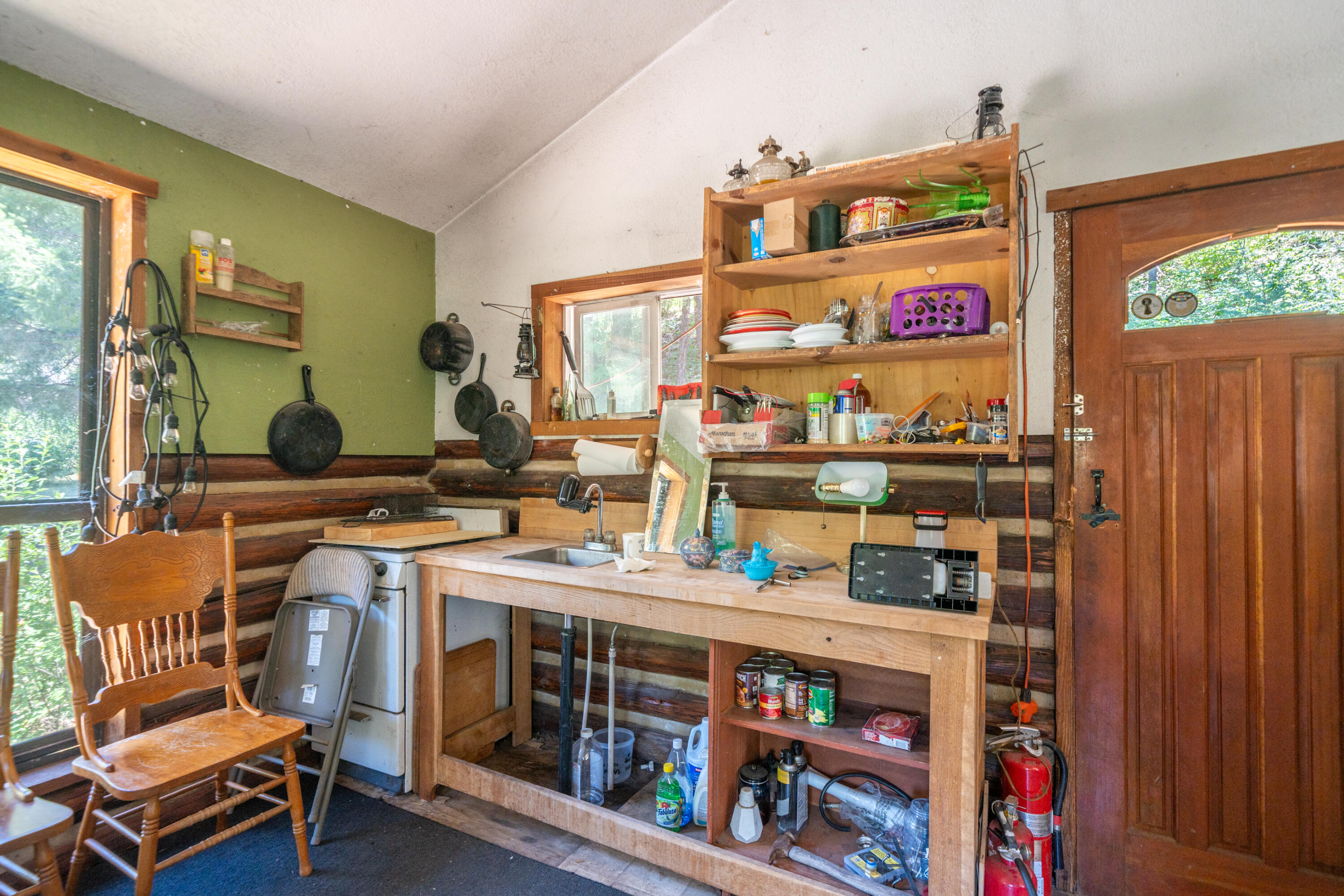 0 East Fork Road French Gulch, CA 96033 - Photo 28 of 78 a room with furniture a rug and a window