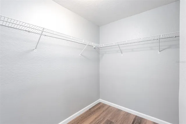 a view of a room with racks on the wall