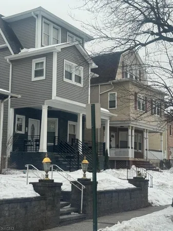a front view of a house with patio