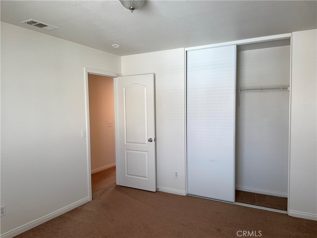 12661 Luna Road Victorville, CA 92392 - Photo 16 of 20 a view of an empty room