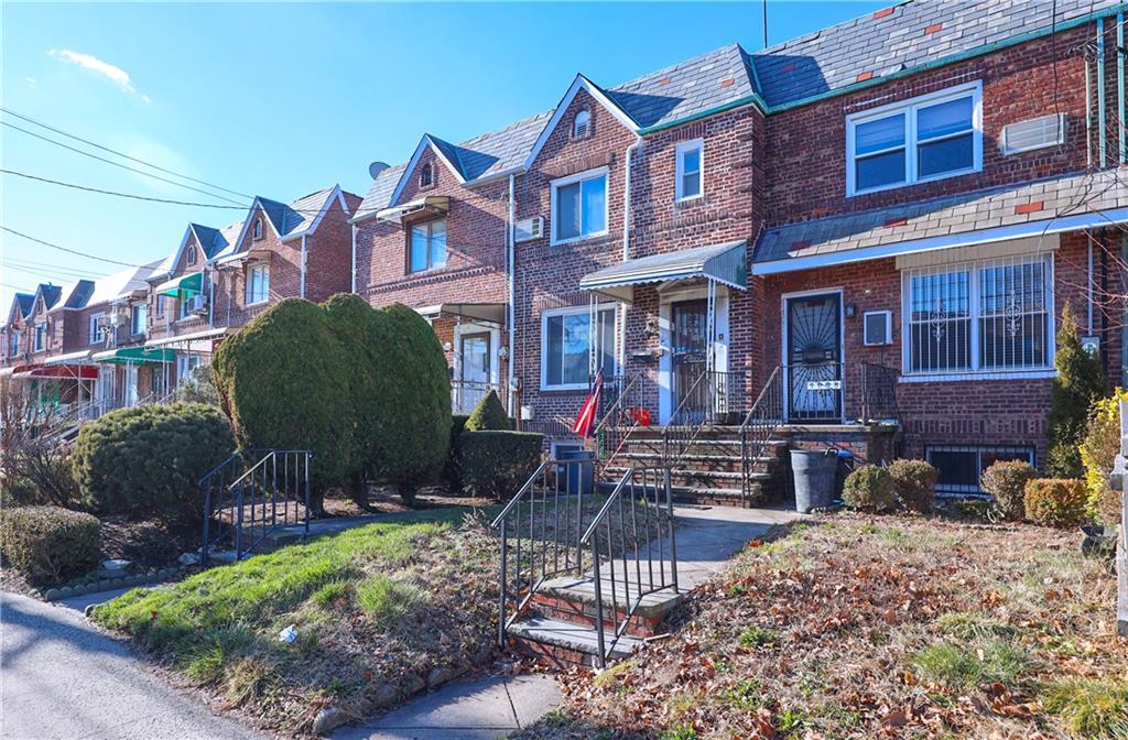 3098 Nostrand Avenue Brooklyn, NY 11229 - Photo 2 of 17 a view of a building with a garden and sitting area