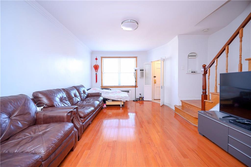 3098 Nostrand Avenue Brooklyn, NY 11229 - Photo 6 of 17 a living room with furniture and a flat screen tv