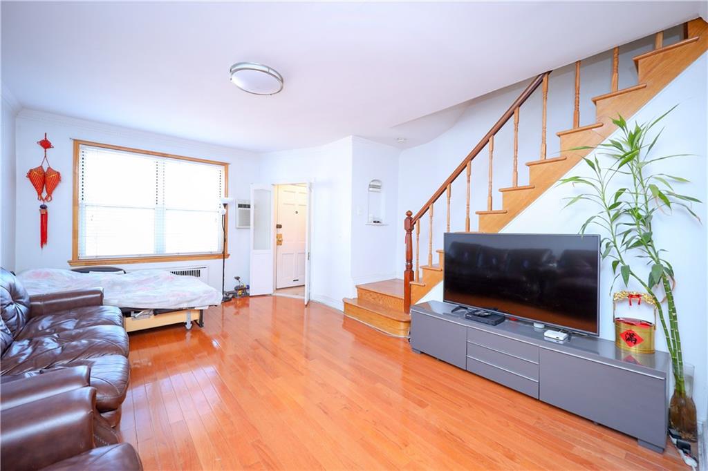3098 Nostrand Avenue Brooklyn, NY 11229 - Photo 7 of 17 a living room with furniture and a flat screen tv