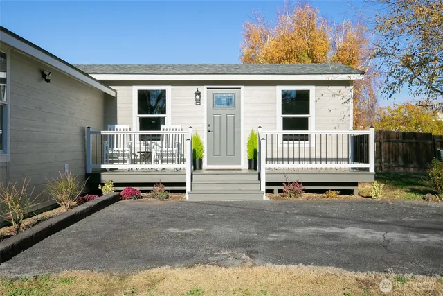 a view of front door of house with outdoor
