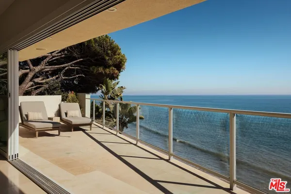 a view of a balcony and mountain view
