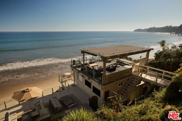 a view of a balcony with an ocean view
