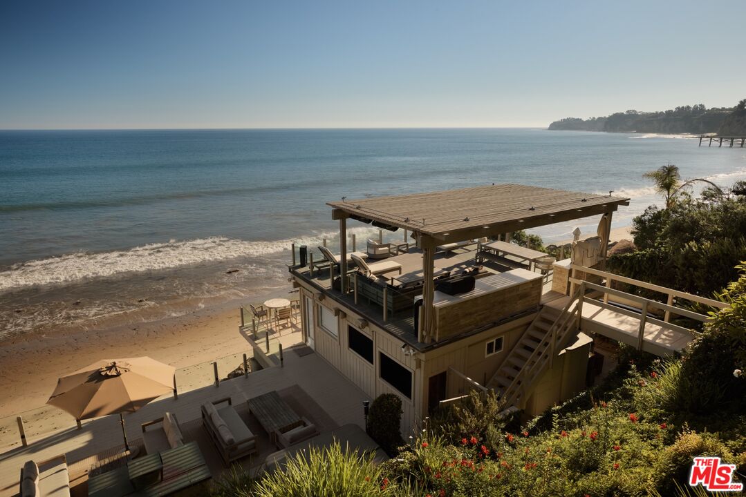 28026 Sea Ln Drive Malibu, CA 90265 - Photo 27 of 37 a view of a terrace with wooden floor and lake view