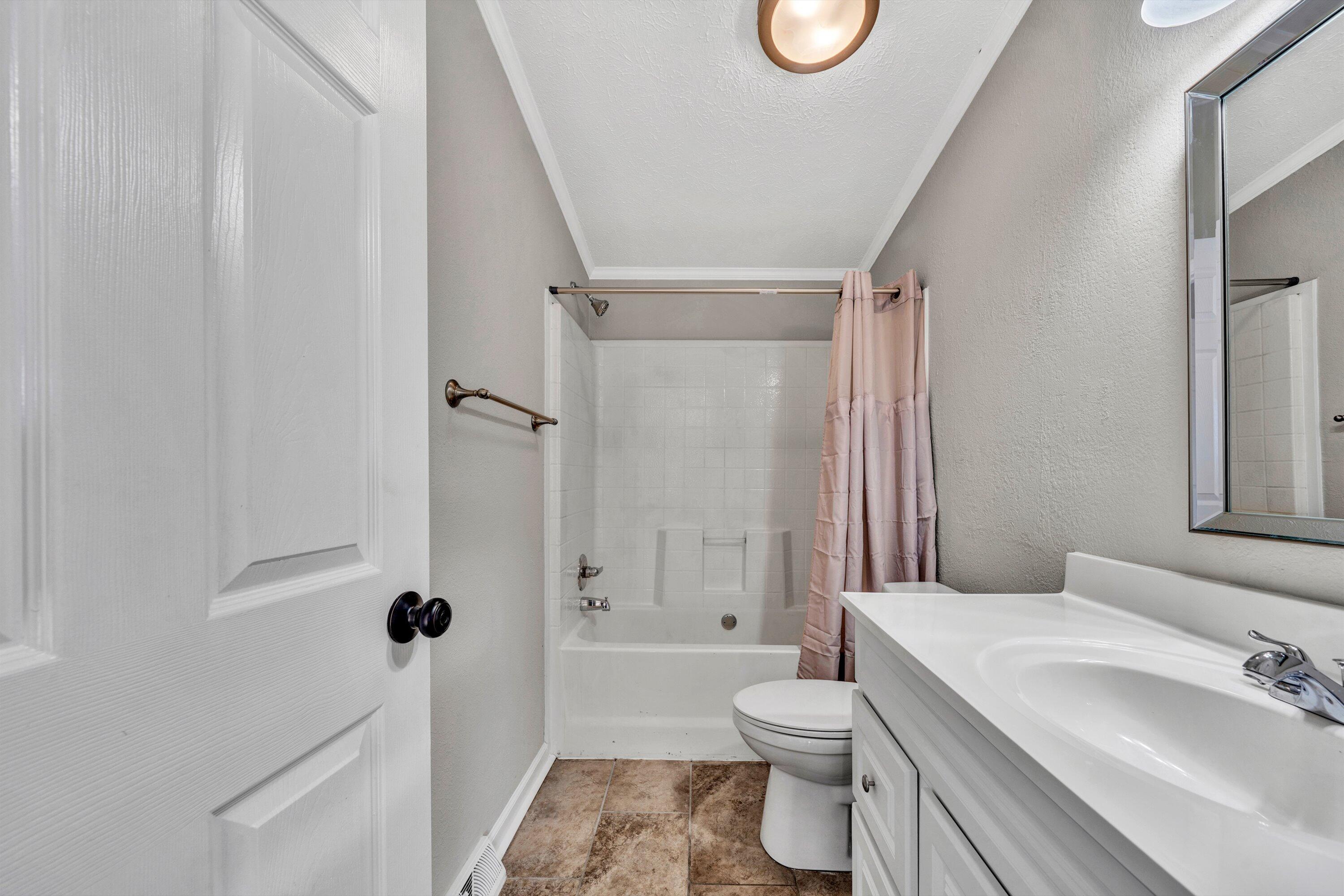 391 Jamestown Road Rocky Mount, VA 24151 - Photo 23 of 40 a bathroom with a sink toilet and shower