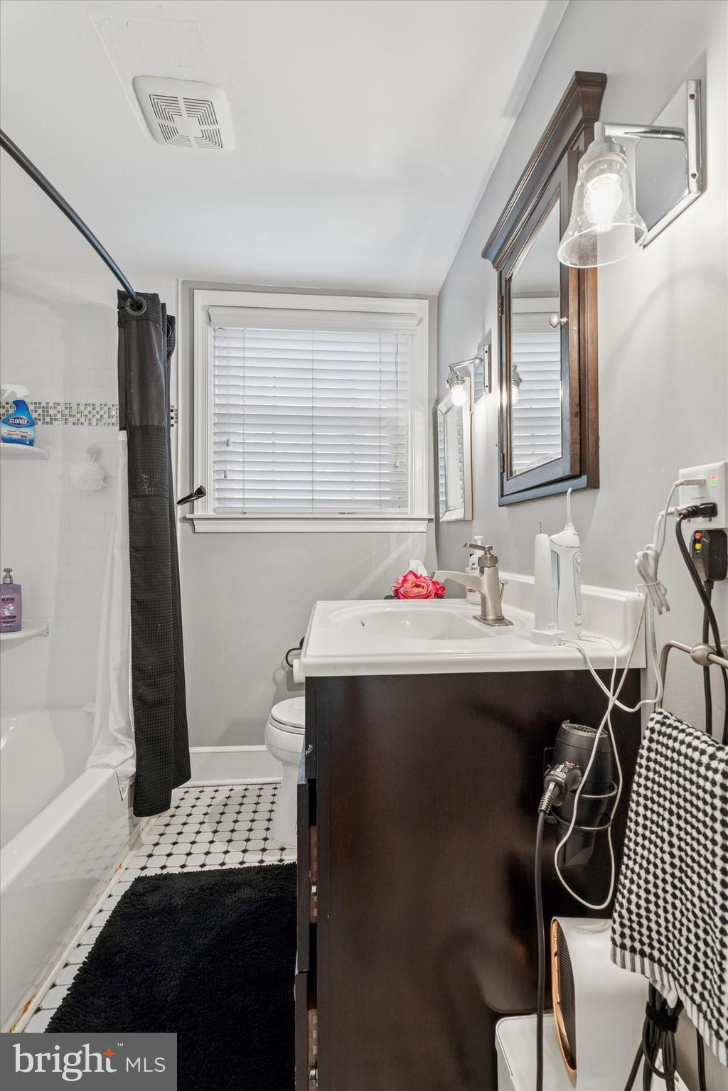 207 Fitzwilliams Road Bryn Mawr, PA 19010 - Photo 19 of 26 a bathroom with a sink and a mirror