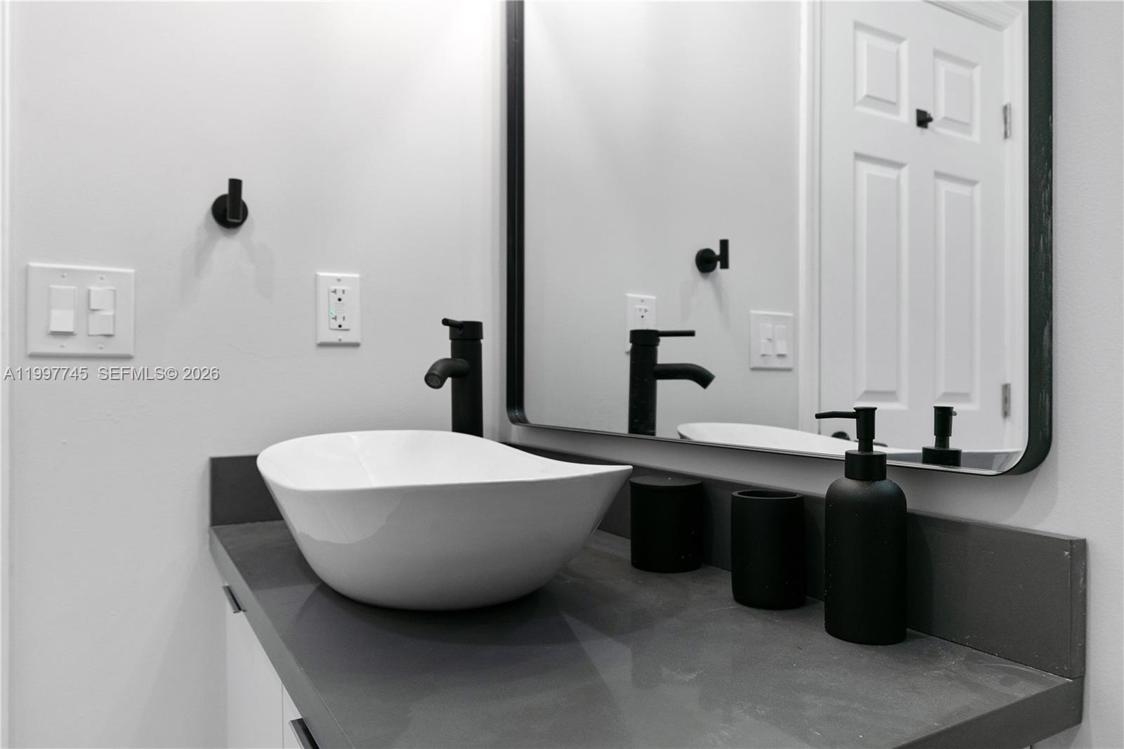 2376 Northwest 2nd Street Miami, FL 33125 - Photo 45 of 77 a bathroom with a bathtub and a sink