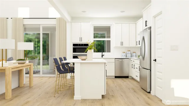 a kitchen with white cabinets and white appliances