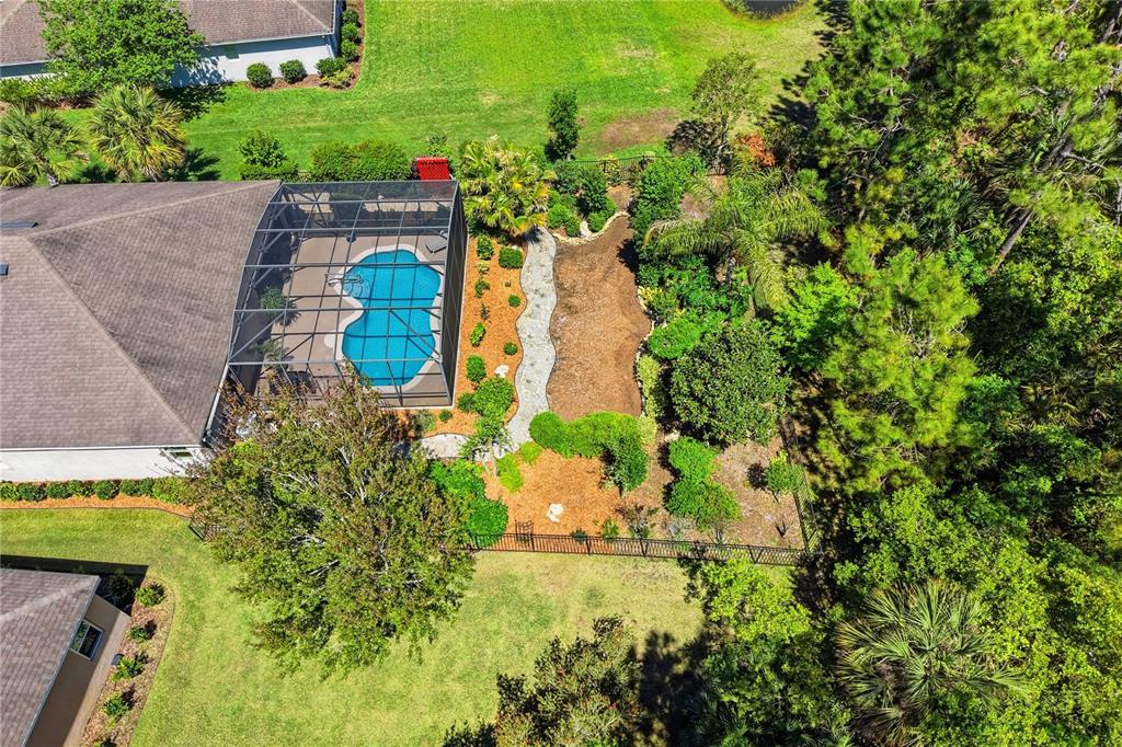 124 South Hummingbird Place Palm Coast, FL 32164 - Photo 37 of 47 an aerial view of residential houses with outdoor space and street view