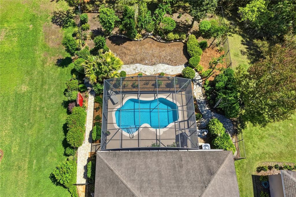 124 South Hummingbird Place Palm Coast, FL 32164 - Photo 38 of 47 an aerial view of a house with a garden
