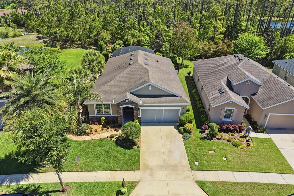 124 South Hummingbird Place Palm Coast, FL 32164 - Photo 40 of 47 an aerial view of a house