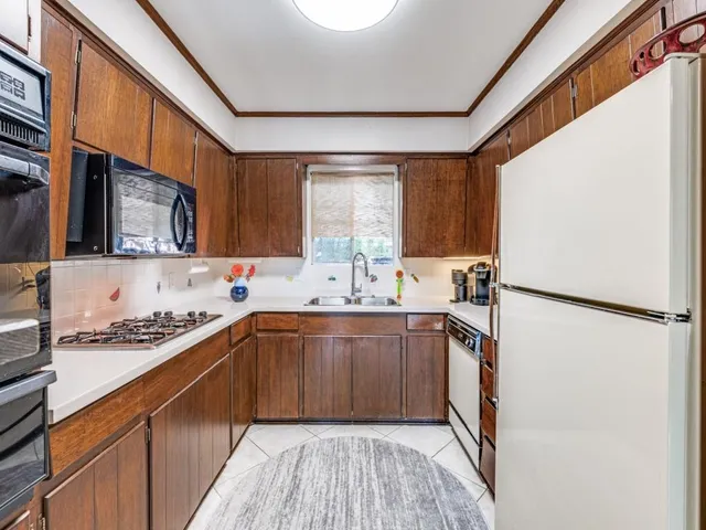 $465,000 | 9052 Fringewood Drive, Dallas, TX 75228