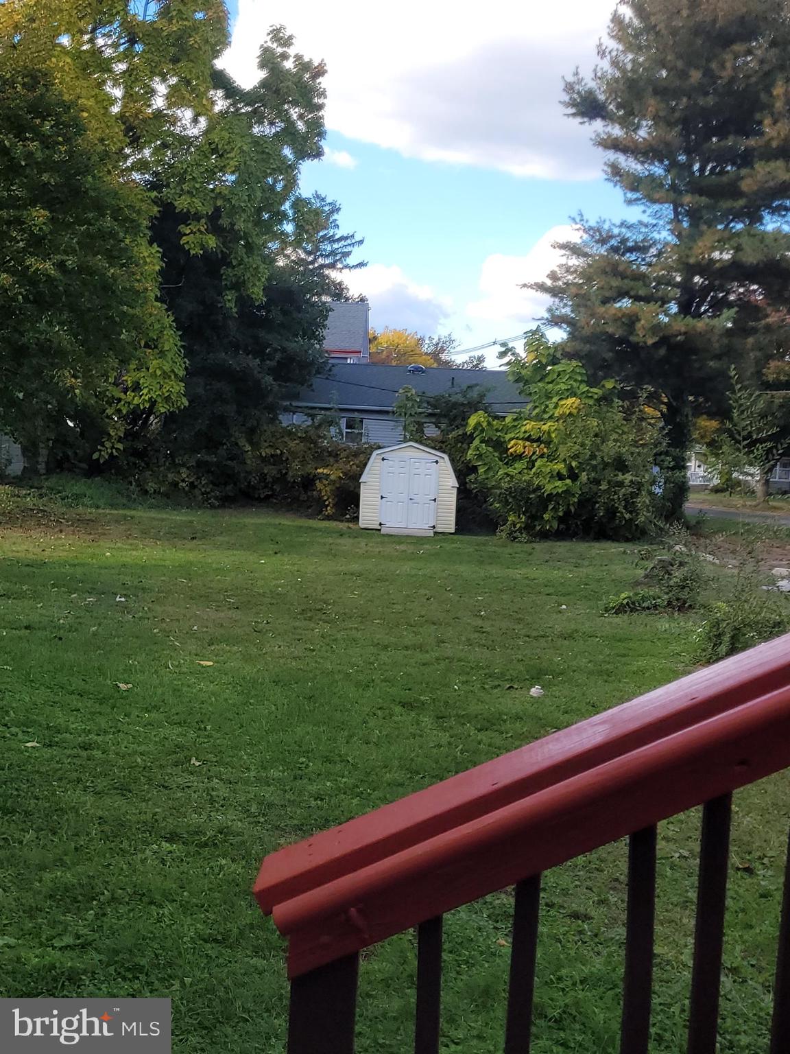 2 East Broad Street, Unit 2 Palmyra, NJ 08065 - Photo 15 of 15 a view of a backyard with plants and a garden