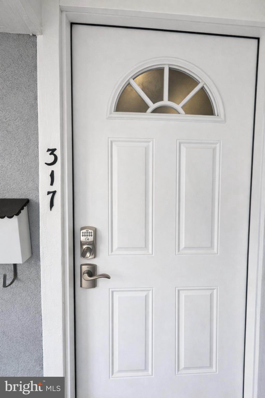 2 East Broad Street, Unit 2 Palmyra, NJ 08065 - Photo 2 of 15 a view of an entryway with table and chair