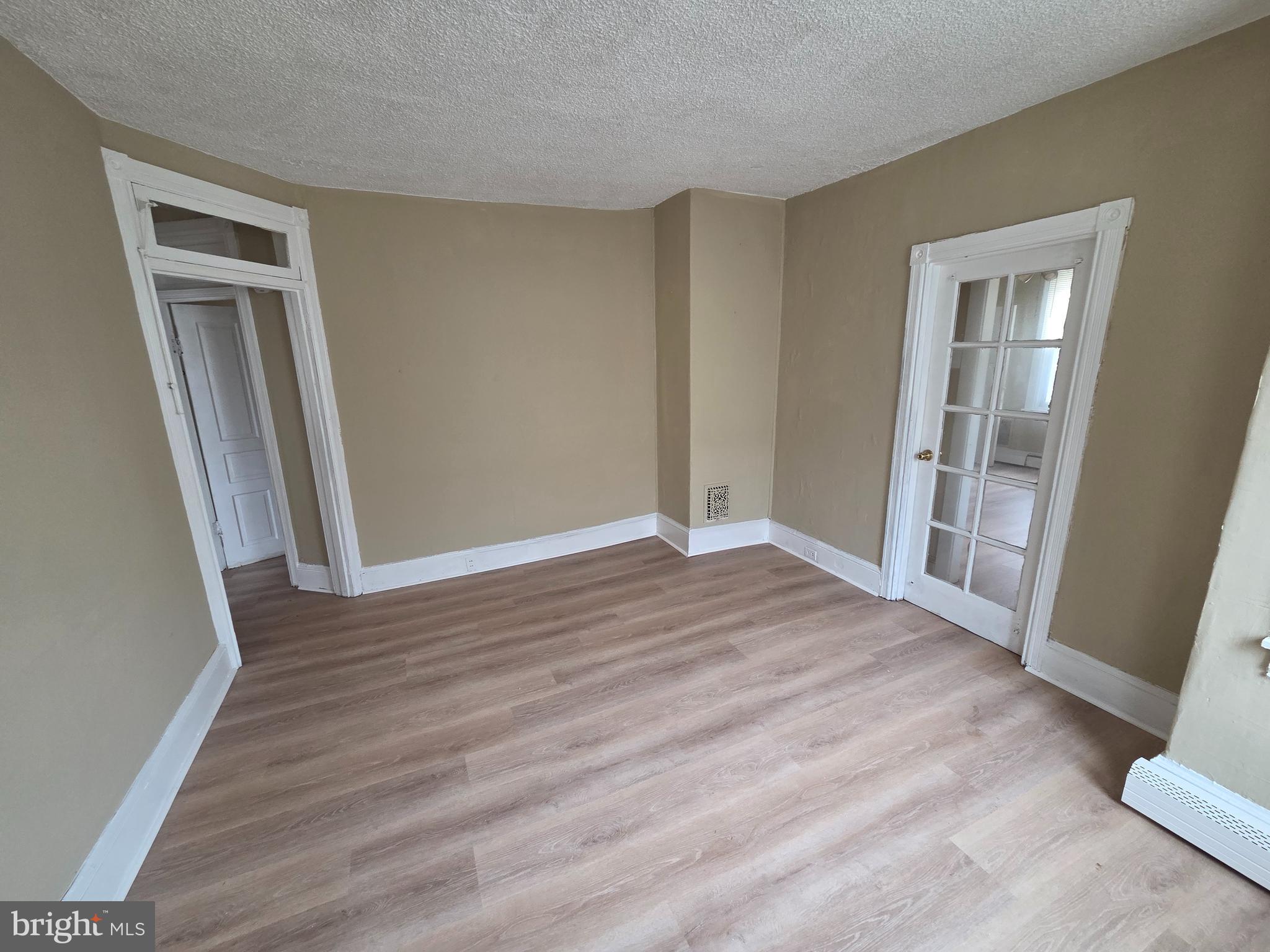 2 East Broad Street, Unit 2 Palmyra, NJ 08065 - Photo 7 of 15 a view of empty room with wooden floor