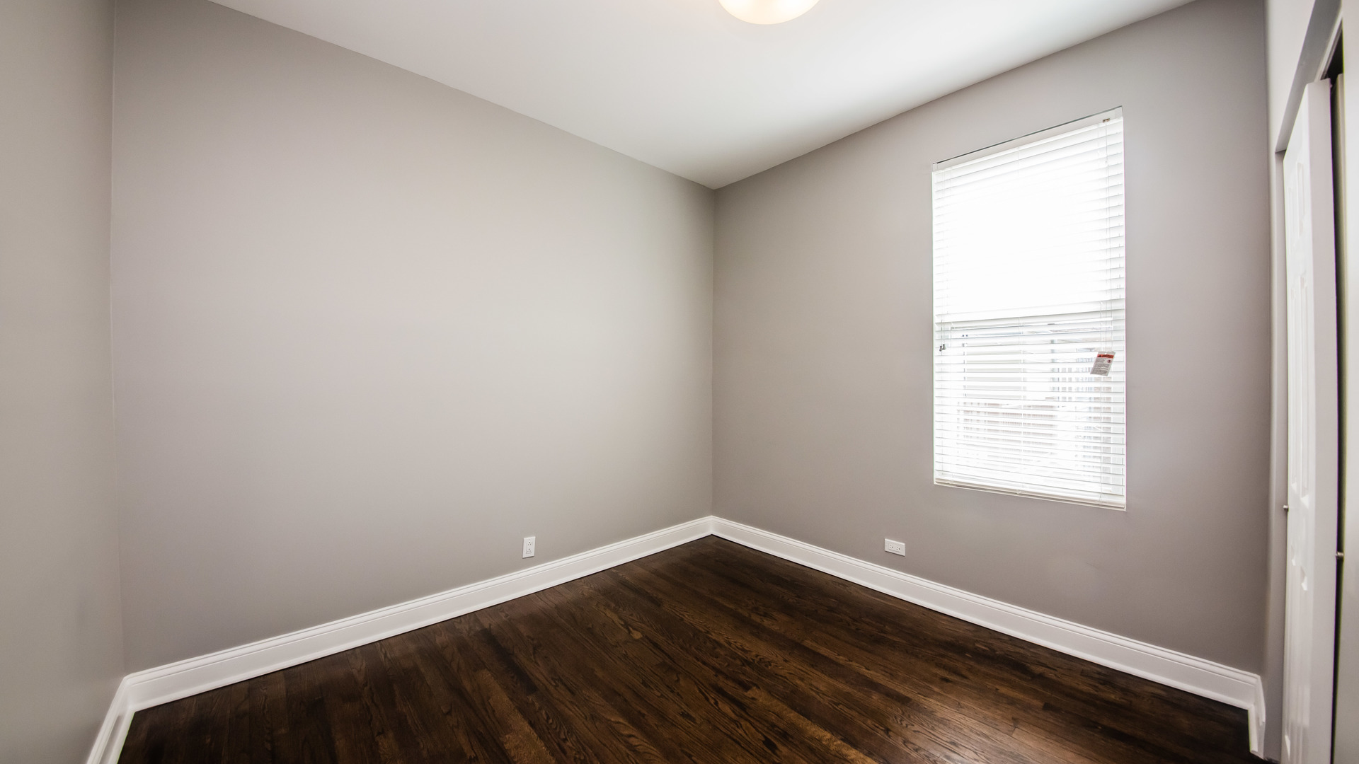 3903 West Belden Avenue, Unit 2 Chicago, IL 60647 - Photo 10 of 15 a room with a window