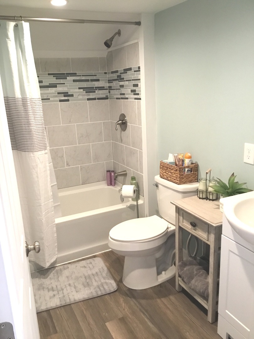 2437 Houghtby Road Shabbona, IL 60550 - Photo 14 of 29 a bathroom with a sink toilet and shower