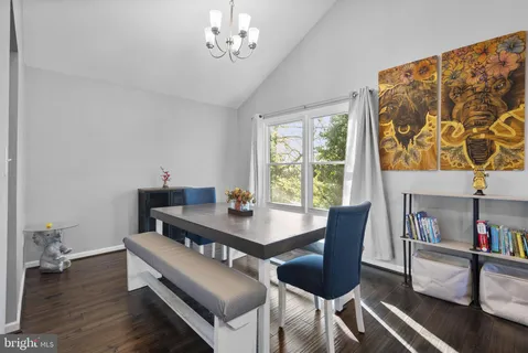 a kitchen with stainless steel appliances a refrigerator stove and microwave
