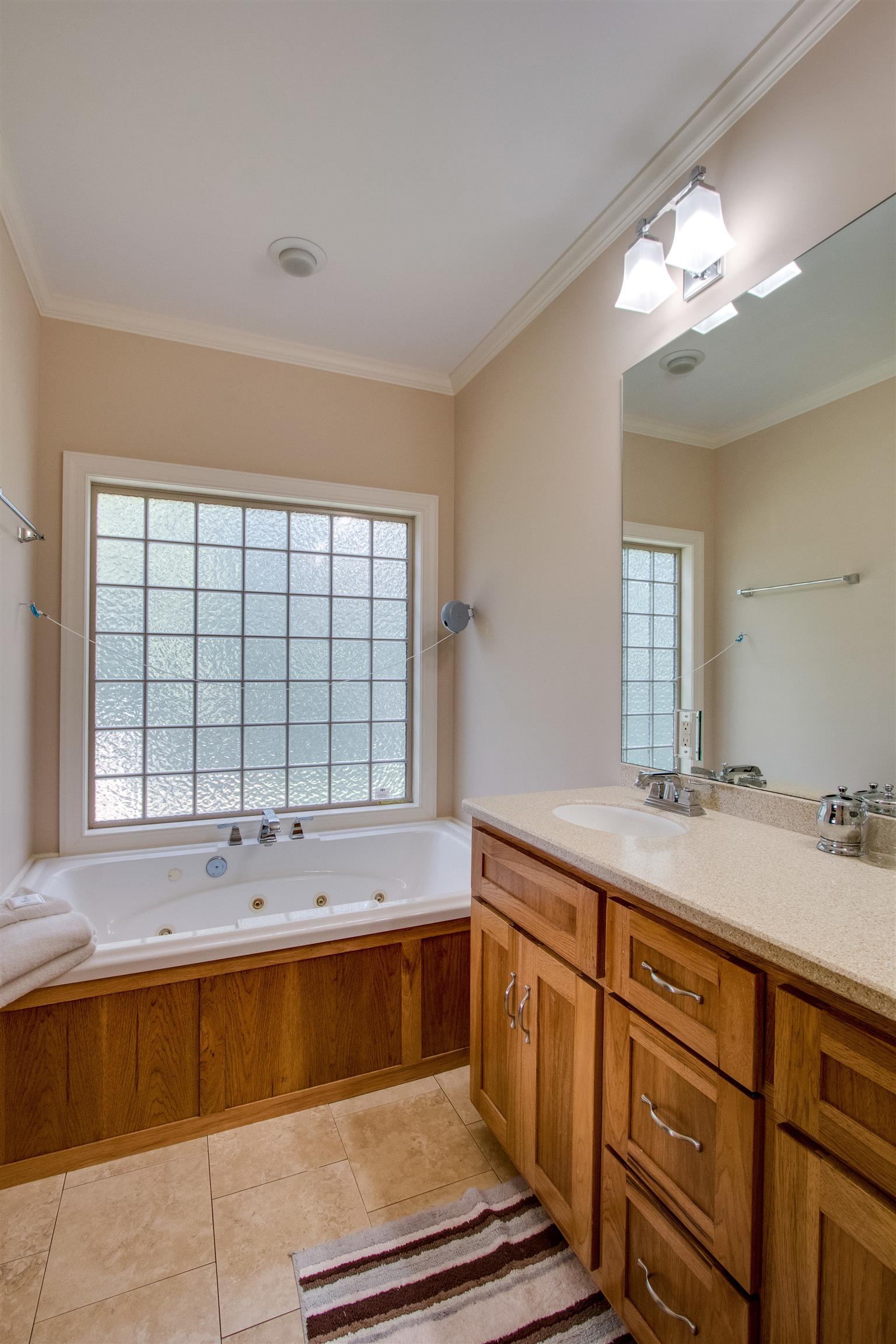 8589 Silver View Lane Silver Point, TN 38582 - Photo 17 of 30 a bathroom with a sink and a bathtub