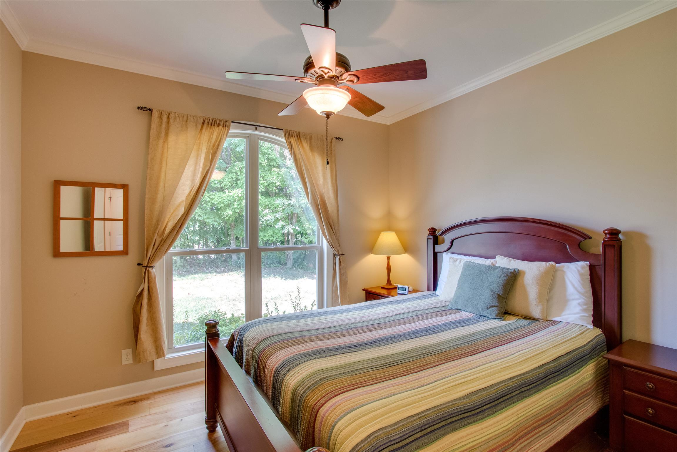 8589 Silver View Lane Silver Point, TN 38582 - Photo 21 of 30 a bedroom with a bed and window
