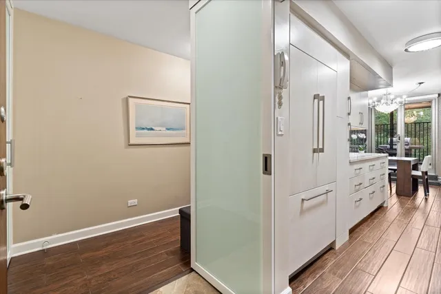 a view of a hallway with closet area