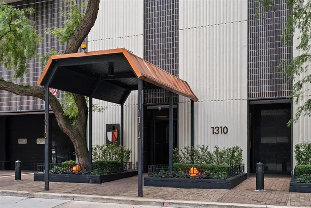 a view of a house with a small garden