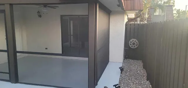 a view of a small space with wooden floor