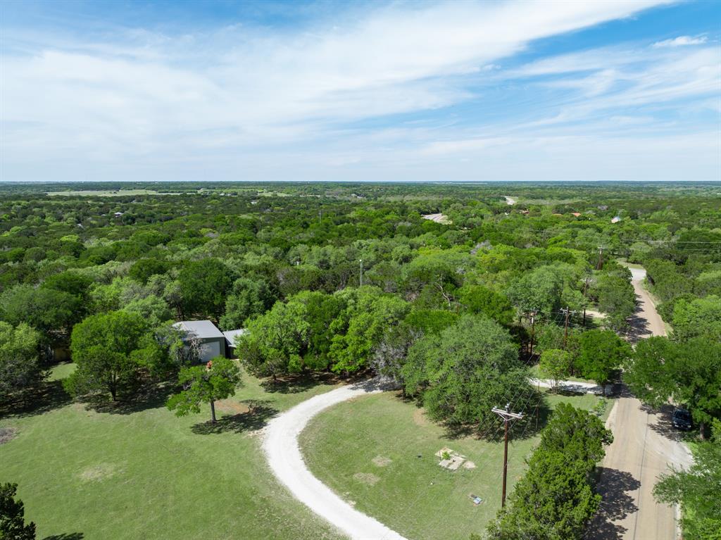 2731 Garrett Lane China Spring, TX 76633 - Photo 17 of 36 a view of a lake in middle of forest