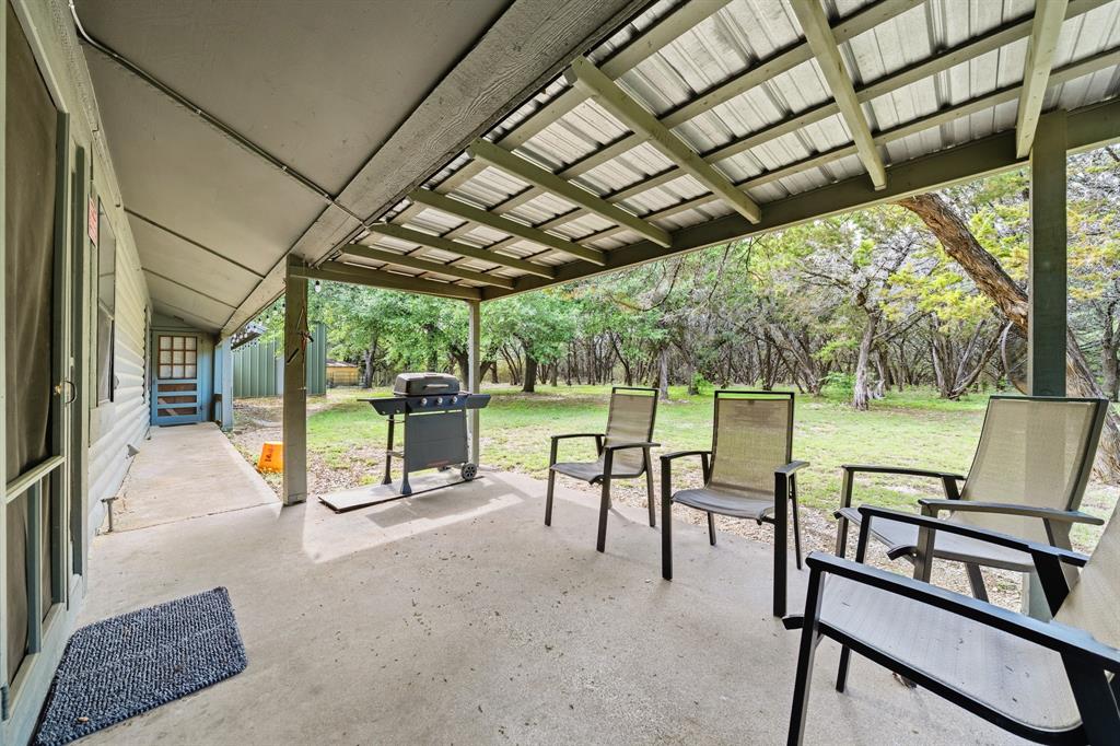 2731 Garrett Lane China Spring, TX 76633 - Photo 19 of 36 a view of a chairs and table in patio