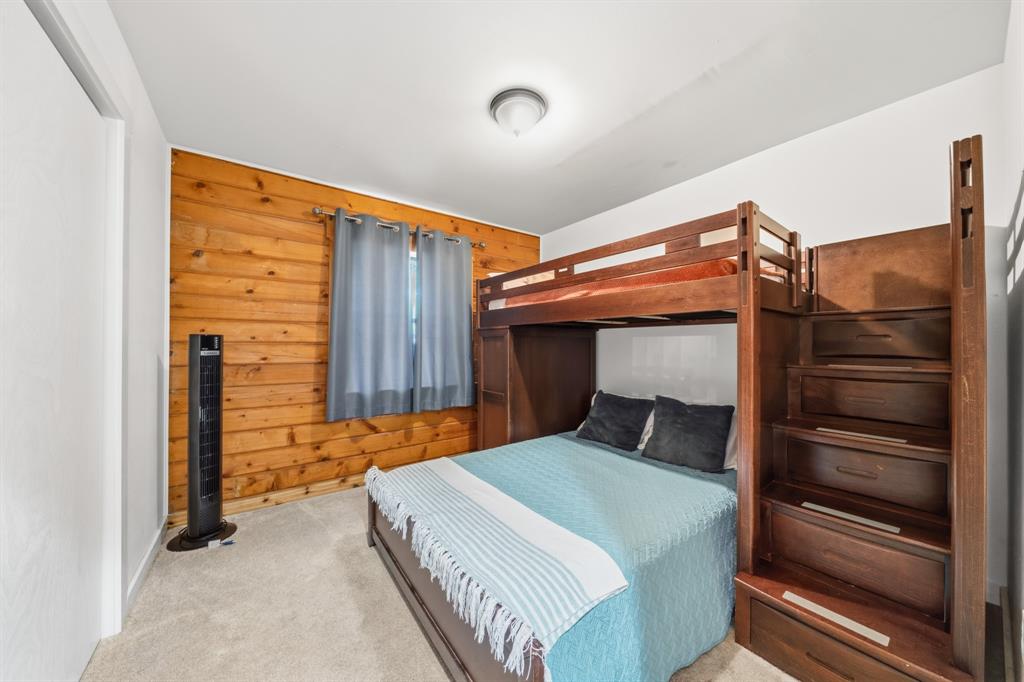 2731 Garrett Lane China Spring, TX 76633 - Photo 28 of 36 a bedroom with a bed and wooden floor