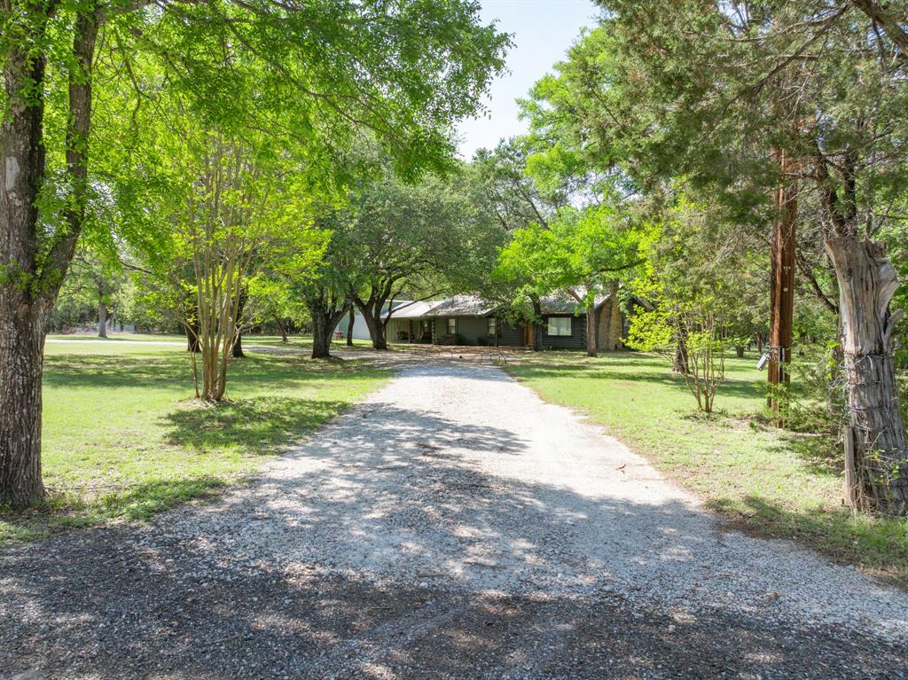 2731 Garrett Lane China Spring, TX 76633 - Photo 3 of 36 a view of a park with tree s