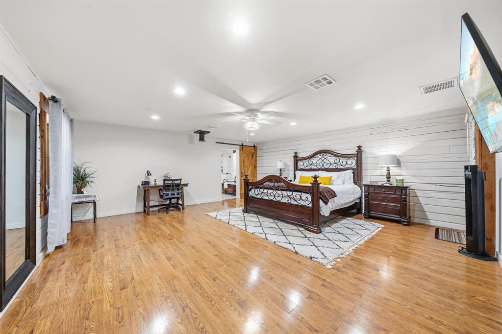 2731 Garrett Lane China Spring, TX 76633 - Photo 34 of 36 a living room with furniture and a wooden floor